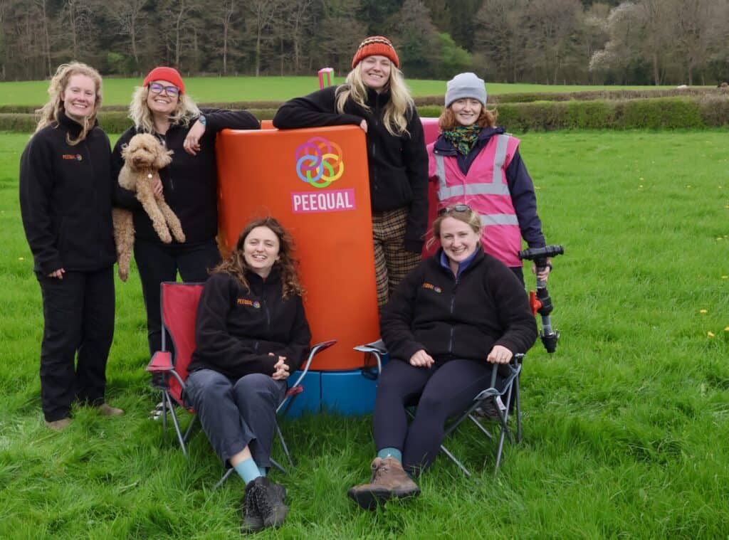 PEEQUAL Team with a women's urinal